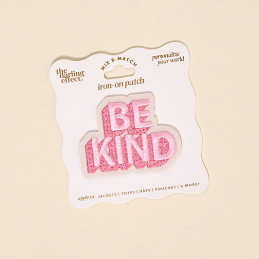 The Darling Effect's Be Kind Mix & Match Iron-On Patch comes on a white backing card with the brand logo. This colorful patch is perfect for customizing jackets, totes, hats, pouches, and more!.