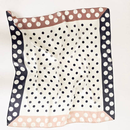 Square scarf with polka dot pattern on a white background