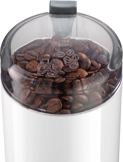 Coffee grinder with coffee beans inside on a white background