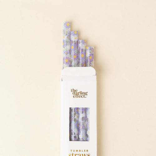 Five Bouquet Beauty Purple 40 oz Tumbler Straws by the-darling-effect are partially pulled from their white box, set against a light beige background. The set is BPA-free and reusable.
