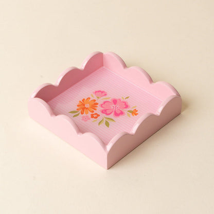 The Dainty Floral Pink Scallop Trinket Tray by the-darling-effect features scalloped edges and pink and orange florals on a striped background—perfect as a jewelry organizer or vanity tray for any neutral space.