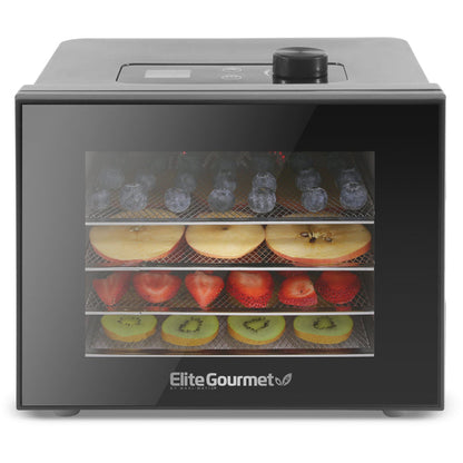 Electric Food Dehydrator with blueberries, apple slices, strawberries and kiwi drying inside.