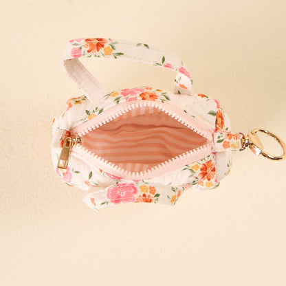 The Endless Daydream Cream Itty Bitty Duffle Bag Charm by the-darling-effect is a small, floral-patterned pouch with a keyring and handle, quilted design, and pink-and-white striped lining—perfect as a tote accessory or bag charm.
