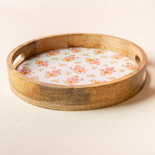 The-darling-effect Endless Daydream Cream Large Round Wood Enamel Tray features side handles and a white base with a pink-orange floral pattern, perfect for serving or display on any light surface. Food-safe and stylish.