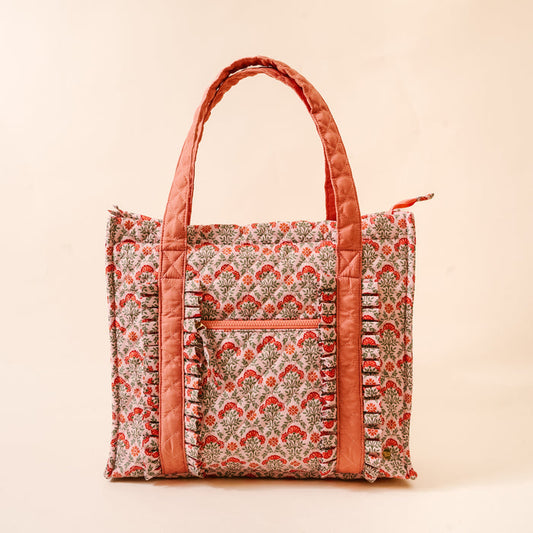 The Darling Effect's Everbloom Dusty Rose The Everyday Quilted Tote Bag features a pink floral print, coral trim, and zippered pocket—perfect for carrying your essentials in style.