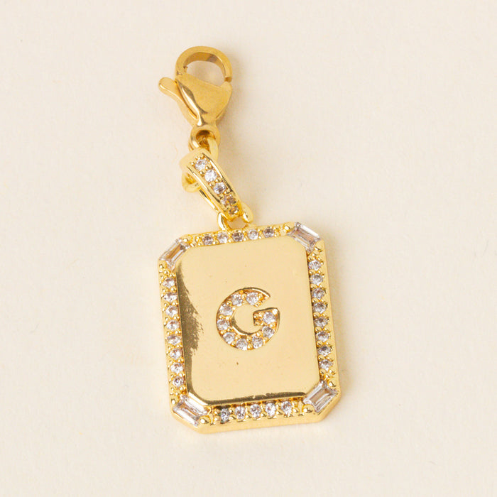 The-darling-effect G Jewelry Charm Initial Letter Gold features a gold-plated brass charm with cubic zirconia accents and clasp—ideal for personalized jewelry or adding to your collection of Initial Letter Jewelry Charms.