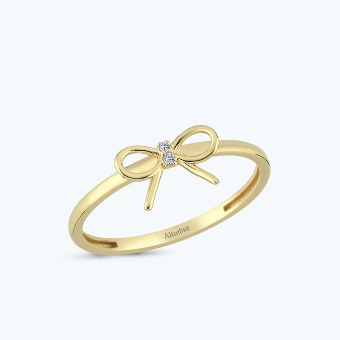 Goldring mit Stein und Schleife