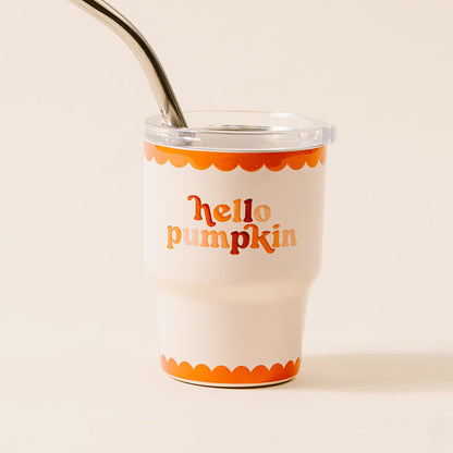 The Darling Effect Hello Pumpkin 2 oz Tiny Tumbler features white insulation, orange scalloped edges, retro "hello pumpkin" lettering, a clear lid, and metal straw—perfect as a party favor or for showcasing autumn prints.