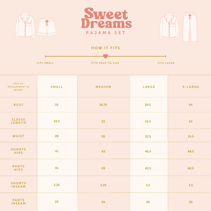 A size chart for The Darling Effect's Jolly Sprig Sweet Dreams Pajama Shorts Set, featuring bust, sleeve, waist, hip, and inseam measurements (in inches) for sizes Small–X-Large. Showcases a pink and gold cozy pajama shorts set.