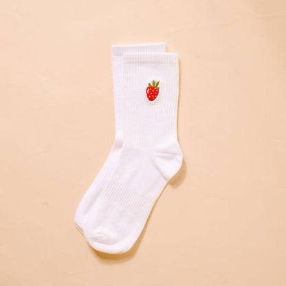 The Darling Effect’s Strawberry Embroidered Crew Socks are white, ribbed women’s socks with a small red strawberry and green leaves stitched near the top—ideal for fans of playful, embroidered socks.
