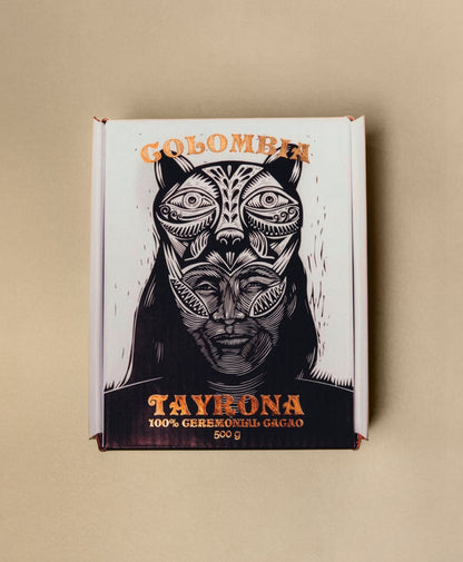 Cocoa packaging with a stylized animal face design on a beige background